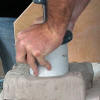 Load the quickcenter with clay